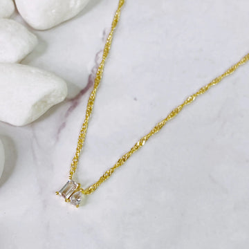 Gold Necklace Pendant: Chic Baguette Cut Stone Design for a Timeless Look
